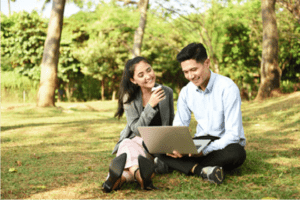 Life Insurance Vancouver | couple planning on grass
