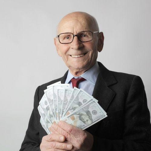 Life Insurance Vancouver | old man with tons of cash